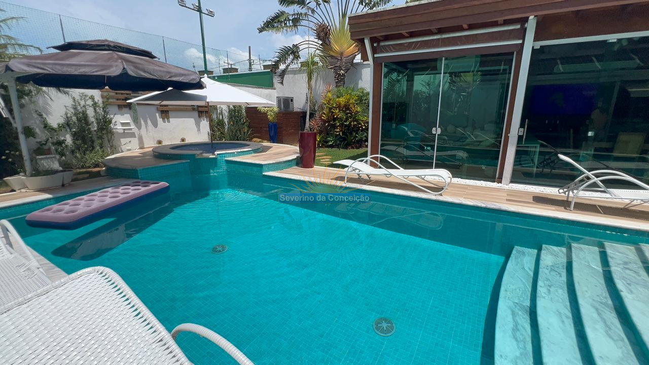 Sobrado alto padrão em condomínio fechado lado praia à venda